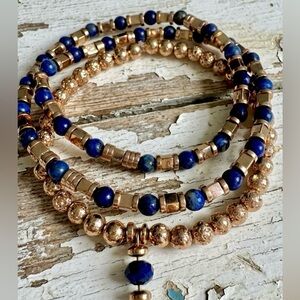 Set of 2 lapis lazuli & gold toned lava stone stretchy & wrap bracelets
